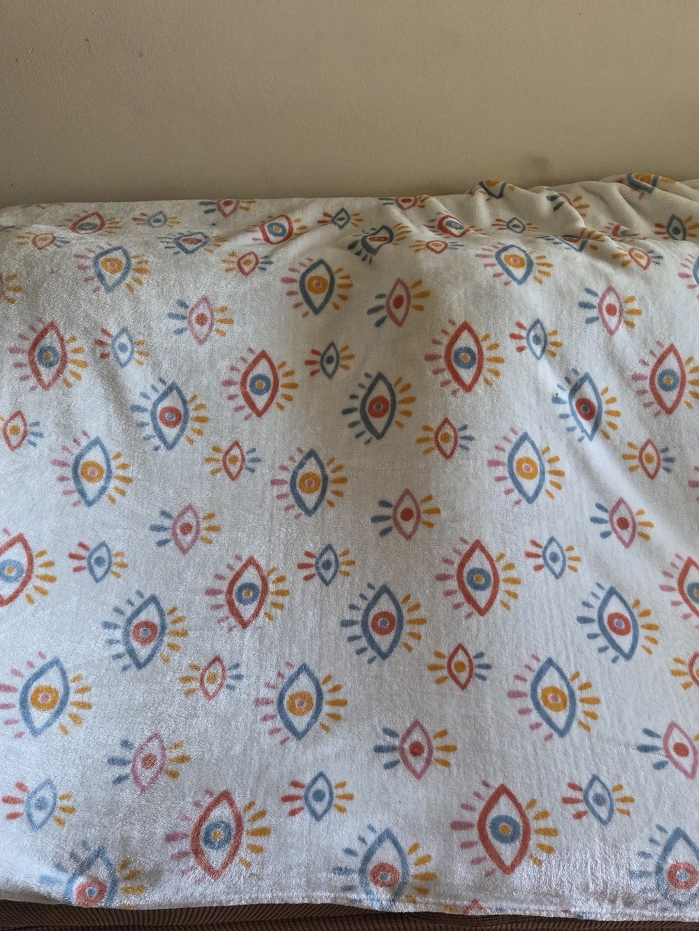 Evil Eye white plush throw, no imperfections.